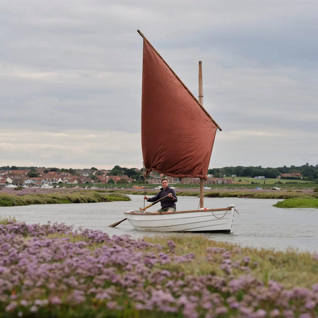A mussel flat sail on a summer's day
